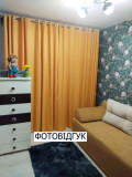 Пошиття тканини на люверсах