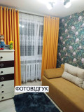 Пошиття тканини на люверсах